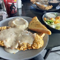 Sandbox - Pictured is the Chicken Fried Steak and a side salad. The CFS was hand breaded we asked the server beforehand.