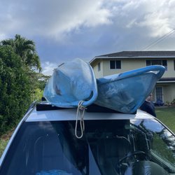 Ka Wai Adventures - Kayaks loaded on top with pads and tie-down straps