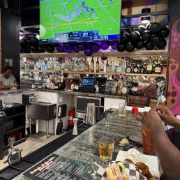 Bar area showing football on tv