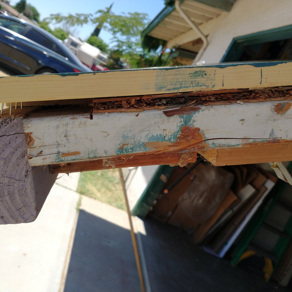 Great Pacific Exterminator - Old rotted wood was not removed (middle) and just covered - Pest Control Near Me - Fresno, California Great Pacific Exterminator - Old rotted wood was not removed (middle) and just covered - Pest Control Near Me - Fresno, California