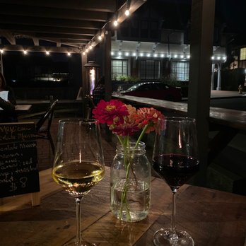 Clean Slate Wine Bar - Cordon of SB Chardonnay & Petite Beast Verdot on the patio - Wine Bars Near Me - Solvang, California Clean Slate Wine Bar - Cordon of SB Chardonnay & Petite Beast Verdot on the patio - Wine Bars Near Me - Solvang, California