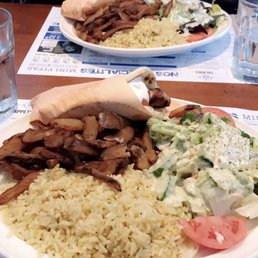 Porc gyro with salad, fries, rice Porc gyro with salad, fries, rice
