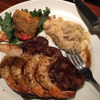 Stonewood Grill & Tavern - Medium Ribeye Steak Oz, very good seasoned grilled shrimp, garlic mashed potatoes... it was so good all of it - New American Near Me - Ormond Beach, Florida Stonewood Grill & Tavern - Medium Ribeye Steak Oz, very good seasoned grilled shrimp, garlic mashed potatoes... it was so good all of it - New American Near Me - Ormond Beach, Florida