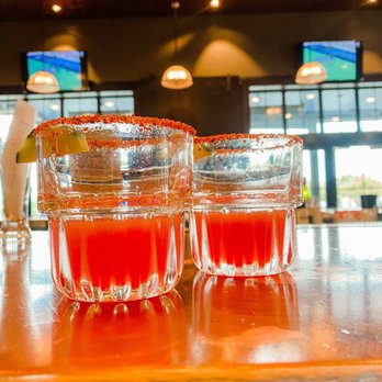 The General Public - Tequlia shots with fresh cucumber and raspberry juice - New American Near Me - San Antonio, Texas