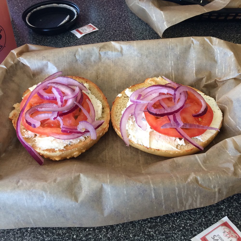 Einstein Bros. Bagels - Asiago bagel, onion & chive cream cheese w/ tomatoes and onion! - Bagels Near Me - Clearwater, Florida Einstein Bros. Bagels - Asiago bagel, onion & chive cream cheese w/ tomatoes and onion! - Bagels Near Me - Clearwater, Florida