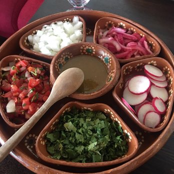 D' La Santa - All the fixings for your meal in an authentic clay serving dish. - Mexican Near Me - Seattle, Washington D' La Santa - All the fixings for your meal in an authentic clay serving dish. - Mexican Near Me - Seattle, Washington