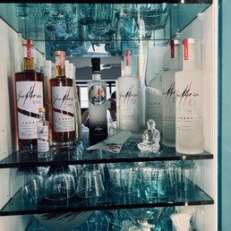 Our Vodka Bar Shelf Includes Guillotine Original, Heritage, & Petrossian Caviar-Infused Guillotine Vodka