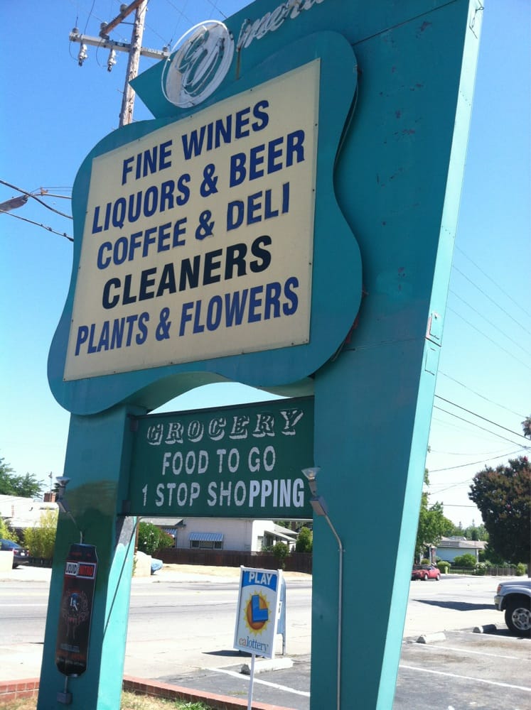 Emerald City Liquors Logo