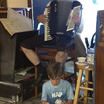 Zur Kate - Robert playing accordian for diners. - German Near Me - Mesa, Arizona Zur Kate - Robert playing accordian for diners. - German Near Me - Mesa, Arizona