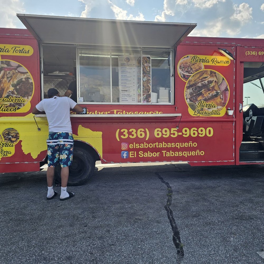 El Sabor Tabasqueno - a man standing in front of a food truck - Food Trucks Near Me - Winston-Salem, North Carolina