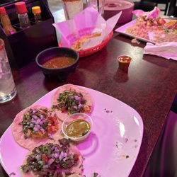 Tikis Mariscos & Bar - Authentic Mexican food.  Delicious all the way through.  Picture after two tacos down and felt the immediate need to leave a review!