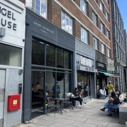 Saint Espresso - If it's sunny outside, why not grab a table on the pavement ? Food and drinks will be brought to you