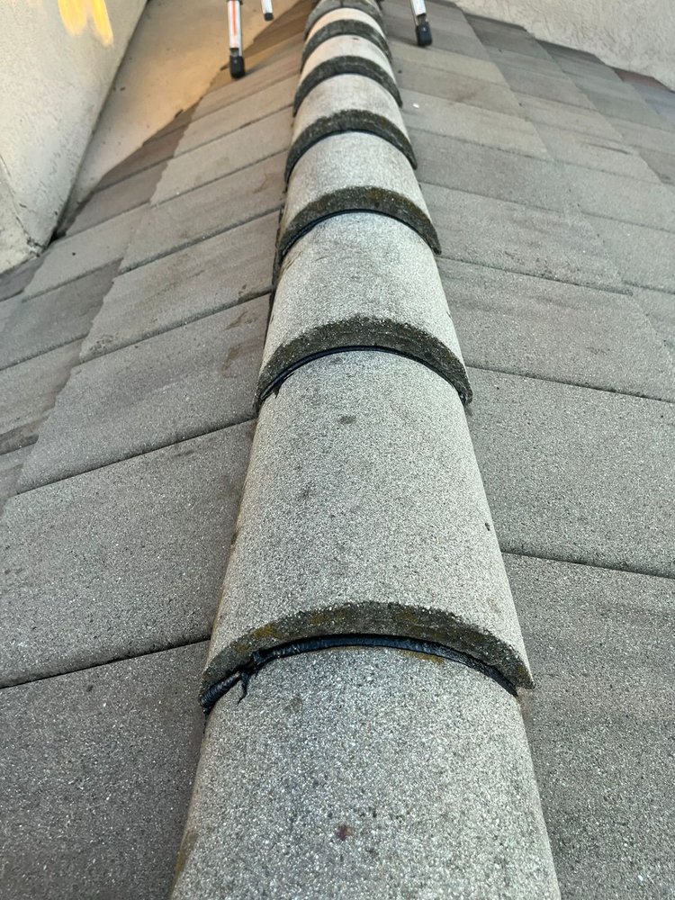 Slide of Tommy´s Roofing