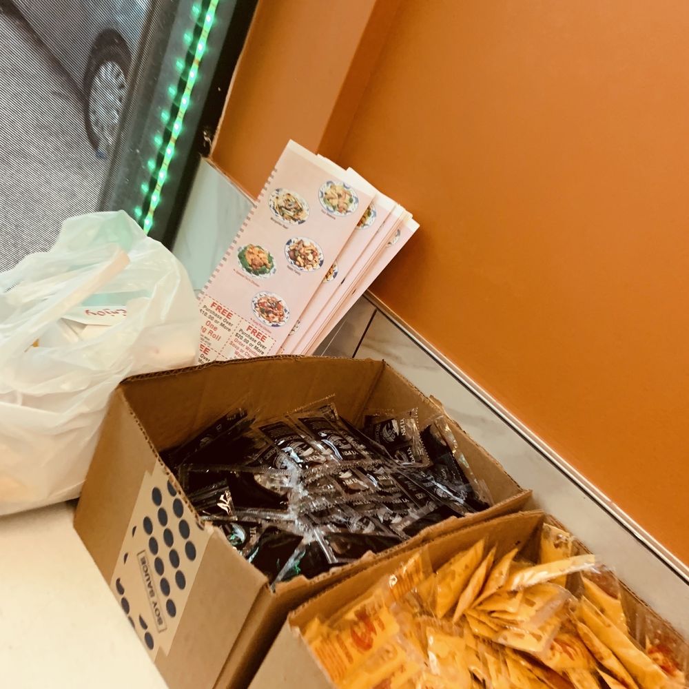 Sun Wah - two boxes of food on a counter - Chinese Near Me - Baltimore, Maryland Sun Wah - two boxes of food on a counter - Chinese Near Me - Baltimore, Maryland