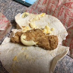 Untouched, disgusting Mac and Cheese Wrap.  Tortilla so Dry its cracking, 3 noodles, and sad 1 1/2 inch soft chicken strip. :(