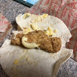 KFC - Untouched, disgusting Mac and Cheese Wrap. Tortilla so Dry its cracking, 3 noodles, and sad 1 1/2 inch soft chicken strip. :(