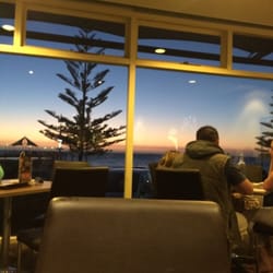 Espy - Take a seat by the window to take in the beach view