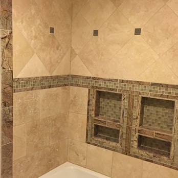 High Class Remodeling - a bathtub in a bathroom - General Contractors Near Me High Class Remodeling - a bathtub in a bathroom - General Contractors Near Me