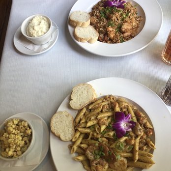 Private Property - Jambalaya (top) with the stone ground grits and the Bayou Bounty with fried creamed corn. - Cajun/Creole Near Me - Lexington, South Carolina Private Property - Jambalaya (top) with the stone ground grits and the Bayou Bounty with fried creamed corn. - Cajun/Creole Near Me - Lexington, South Carolina
