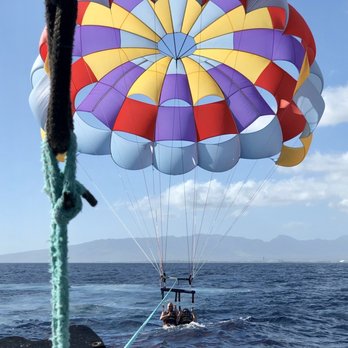 X-Treme Parasail - Dunking in the ocean before coming back on the boat - Parasailing Near Me - Honolulu, Hawaii