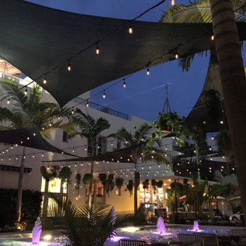 Sola - Nighttime lights and the beautiful fountain - Breakfast & Brunch Near Me - Miami Beach, Florida Sola - Nighttime lights and the beautiful fountain - Breakfast & Brunch Near Me - Miami Beach, Florida
