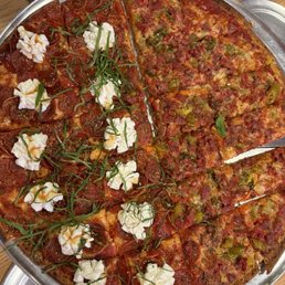 Half of longanisa and giardiniera pizza and half of hot honey pepperoni pizza Half of longanisa and giardiniera pizza and half of hot honey pepperoni pizza