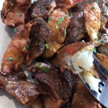Azul 18 - Potatoes?!in what way? Brunt prices to a crisp. Drenched in oil. Over cooked. More burnt than soft - New American Near Me - Chicago, Illinois