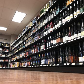 Pedulla's Liquor Store - shelves full of bottles - Beer, Wine & Spirits Near Me - Geneva, New York