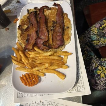 Mike's Place - This was the kids meal that was the pancake and bacon breakfast thing. it also came with an ice cream bar when she was done. - American Near Me - Kent, Ohio Mike's Place - This was the kids meal that was the pancake and bacon breakfast thing. it also came with an ice cream bar when she was done. - American Near Me - Kent, Ohio