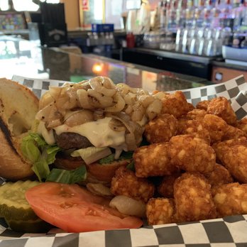 Lakeside Pub and Grill - Burger with fries onions and tator tots - Pubs Near Me - Cudahy, Wisconsin Lakeside Pub and Grill - Burger with fries onions and tator tots - Pubs Near Me - Cudahy, Wisconsin