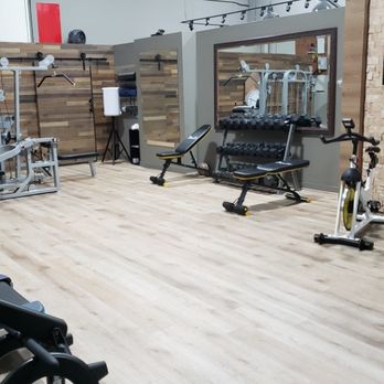 A&B Handyman Services - This gym project took a some time since the client wanted to use vinyl flooring. Wood panels for the wall and barn door. - Handyman Near Me A&B Handyman Services - This gym project took a some time since the client wanted to use vinyl flooring. Wood panels for the wall and barn door. - Handyman Near Me