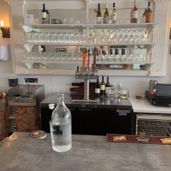 Charles E Fromage - a bar with wine glasses and bottles - Beer Bar Near Me - Milwaukee, Wisconsin Charles E Fromage - a bar with wine glasses and bottles - Beer Bar Near Me - Milwaukee, Wisconsin