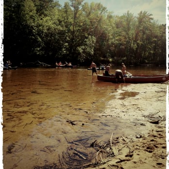 River Run Canoe Rental - Stopping at one of the many small beaches along the river. - Campgrounds Near Me - Brownfield, Maine River Run Canoe Rental - Stopping at one of the many small beaches along the river. - Campgrounds Near Me - Brownfield, Maine