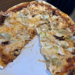 Customized Cheese Pizza with Artichoke, Chicken, Extra Cheese, Onions, and Sun Dried Tomato.