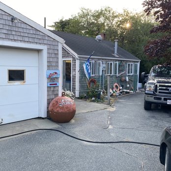 Souza's Seafood - a fire hydrant in front of a garage - Seafood Markets Near Me - Nantucket, Massachusetts Souza's Seafood - a fire hydrant in front of a garage - Seafood Markets Near Me - Nantucket, Massachusetts
