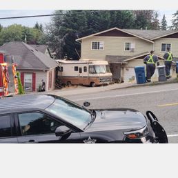 This RV came loose on one of their medium duty trucks about 4 months ago and crashed into this residential house,,