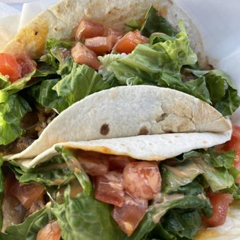 DC Smoothies and Fresh Eats - a taco with lettuce and tomatoes - Juice Bars & Smoothies Near Me