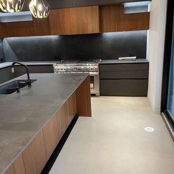 AK Level & Polish - a kitchen with stainless steel countertops - Flooring Near Me - Toronto, Ontario