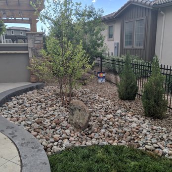 Denver Patios and Landscape - Large granite rocks placed for decor - Landscaping Near Me - Denver, Colorado Denver Patios and Landscape - Large granite rocks placed for decor - Landscaping Near Me - Denver, Colorado
