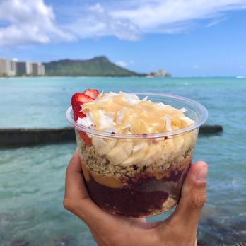 Tropical Tribe - Hawaiian Açaí Bowl Tropical Tribe Açaí Bowl BASE: Açaí TOPPINGS: Granola, Banana, Strawberries, Blueberries, PB, Coconut & Raw Honey - Juice Bars & Smoothies Near Me - Honolulu, Hawaii Tropical Tribe - Hawaiian Açaí Bowl Tropical Tribe Açaí Bowl BASE: Açaí TOPPINGS: Granola, Banana, Strawberries, Blueberries, PB, Coconut & Raw Honey - Juice Bars & Smoothies Near Me - Honolulu, Hawaii
