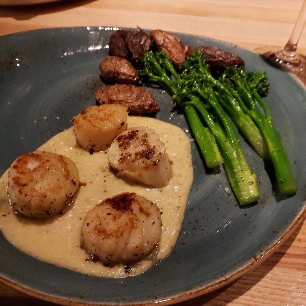 Silver Fox Steakhouse - The scallops served with fingerling potatoes and broccolini. - Steakhouses Near Me - Fort Worth, Texas Silver Fox Steakhouse - The scallops served with fingerling potatoes and broccolini. - Steakhouses Near Me - Fort Worth, Texas