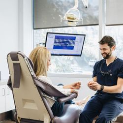Mountain Brook Smiles - Dr. Craig Rousso with a patient.