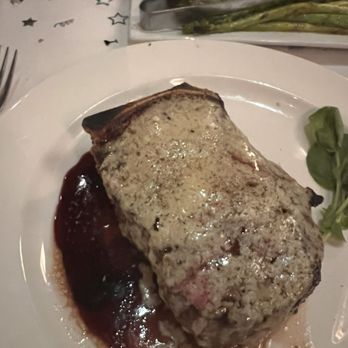 The Capital Grille - Dry aged Gorgonzola encrusted strip steak - Steakhouses Near Me - Troy, Michigan The Capital Grille - Dry aged Gorgonzola encrusted strip steak - Steakhouses Near Me - Troy, Michigan