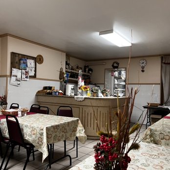 Streecha - a dining room with tables and chairs - Ukrainian Near Me - New York, New York Streecha - a dining room with tables and chairs - Ukrainian Near Me - New York, New York