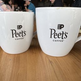 Large mocha and cappuccino... Iin peets signature mugs that make everything better of course