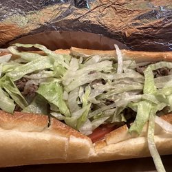 Paradise Pizza - Steak Combo and Cheese Grinder with mayo, lettuce, and tomato.
