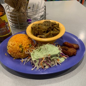Francisco's Restaurant - Goat Curry with Yellow Rice a - Caribbean Near Me - Rochester, Minnesota