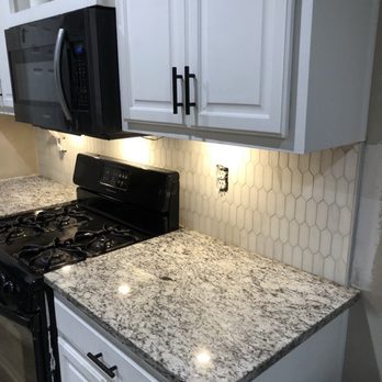 Premier General Contractors - New backsplash and countertops. - Painters Near Me