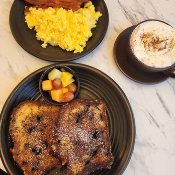 Bell the Cat - Blueberry bread French Toast  with a side of scrambled eggs (with pepper jack cheese) and bacon - Coffee & Tea Near Me - Belfast, Maine