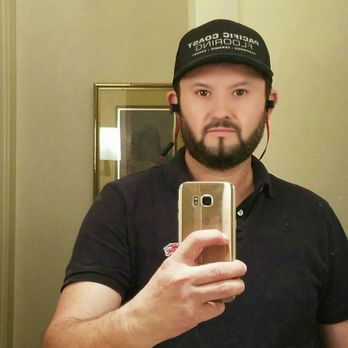 Pacific Coast Flooring - a man taking a selfie - Flooring Near Me